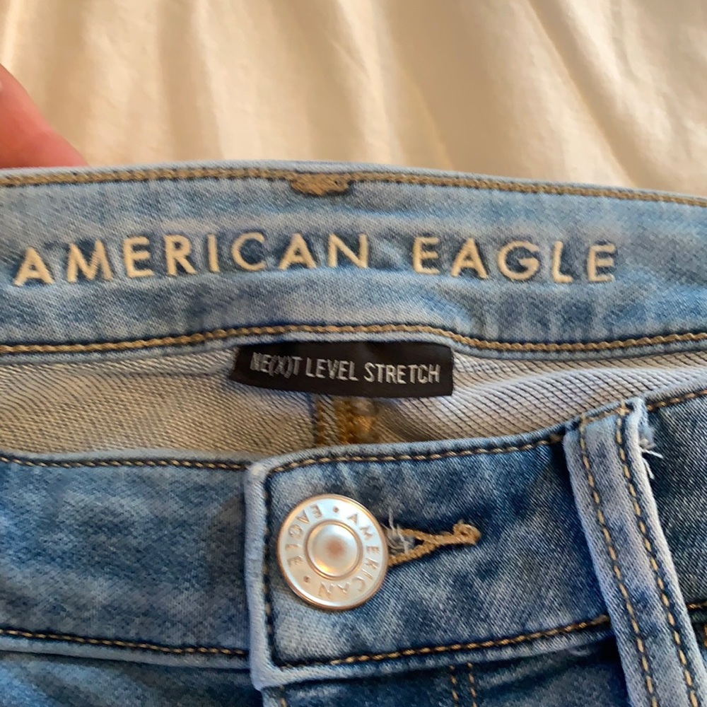 American Eagle light wash jeans.
